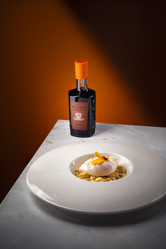Poached Egg with Rosemary Crumble and Balsamic Vinegar of Modena